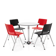 Sillas Reload de Dile Office en rojo y negro con mesa de reunión central