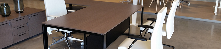 Sillas de oficina Neo+ de Dile Office para despacho en modelo con respaldo alto y ruedas y confidente