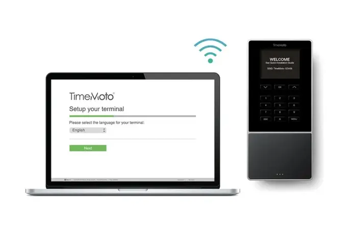 Ordenador portátil y reloj para fichar