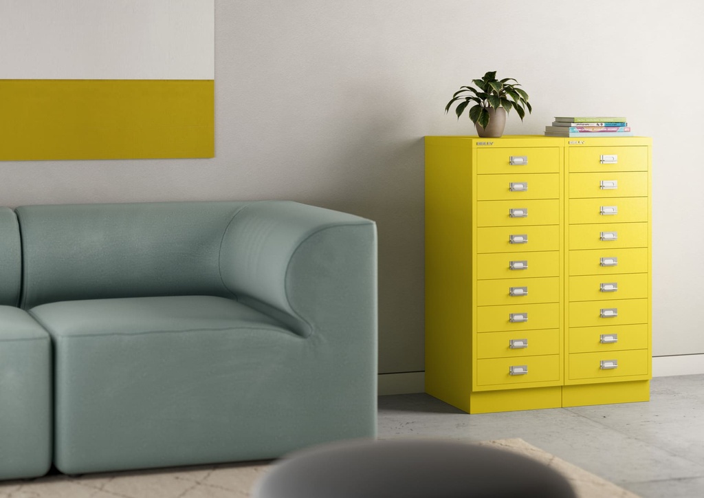 Salón con archivador multigavetas Bisley 114 en color amarillo