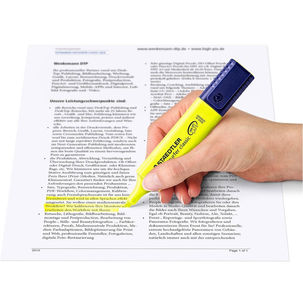 Rotulador fluorescente Staedtler Textsurfer Classic resaltando texto sobre papel impreso