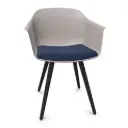 Silla Noom 60 con 4 patas de madera y asiento tapizado